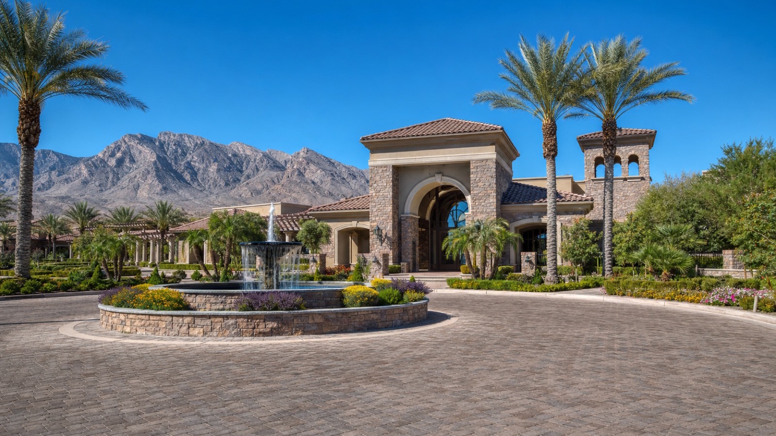 Painted Desert country club clubhouse and pool deck with palm trees